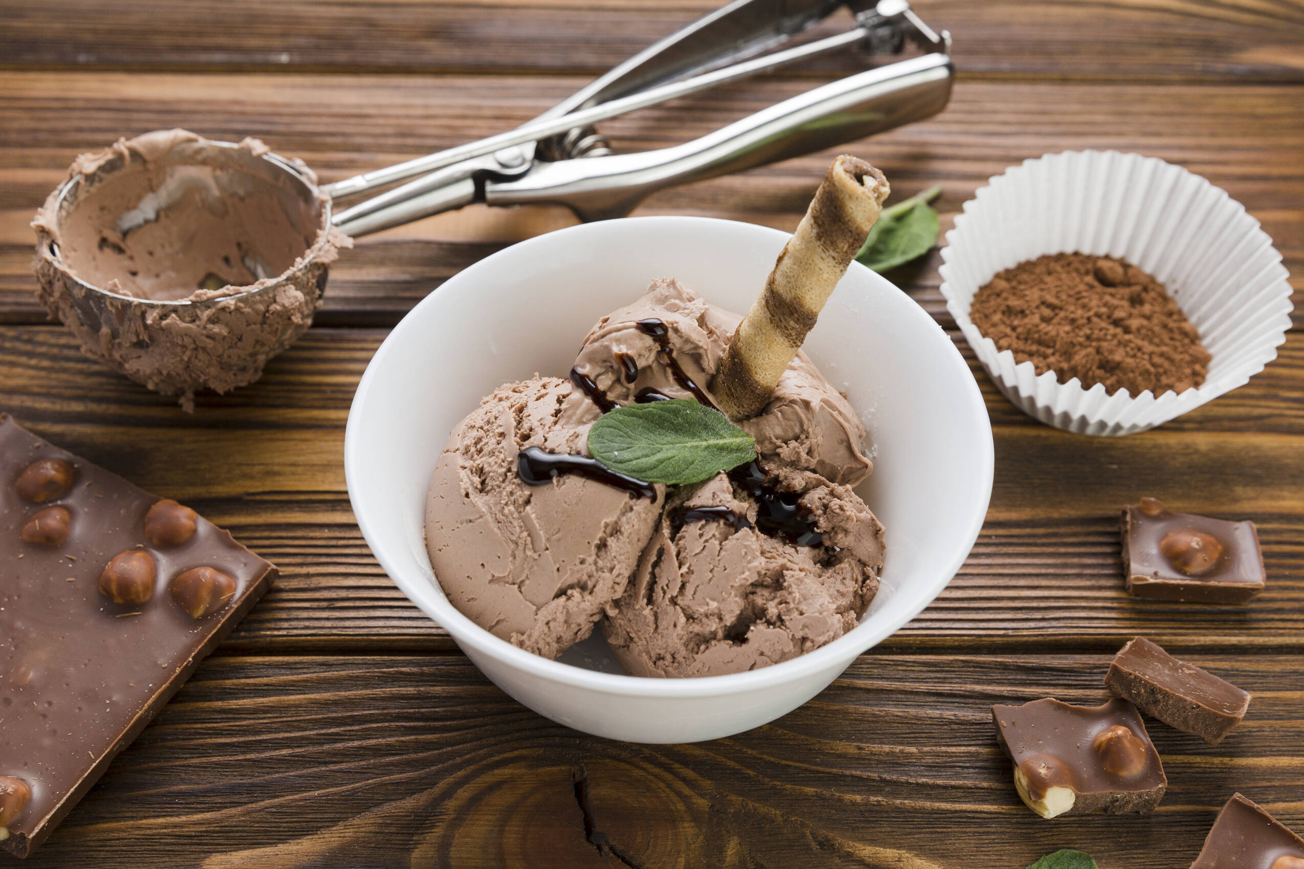 Chocolate ice cream bowl wooden table